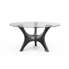 Sleek Sculptural Dining Table with Fiberglass Frame and Glass Top for Modern Decor