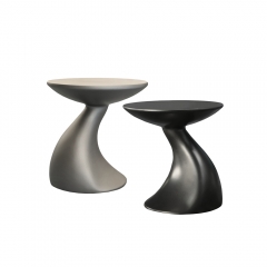 Minimalist Curved Accent Table with Fiberglass Construction and Metal Lacquer