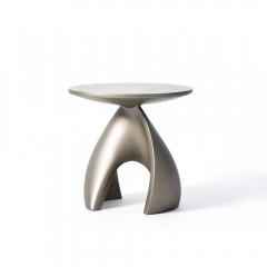 Contemporary Abstract Accent Table with Fiberglass Construction and Metal Lacquer