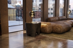 Textured Volcanic Rock Surface End Table with Lightweight Fiberglass Construction