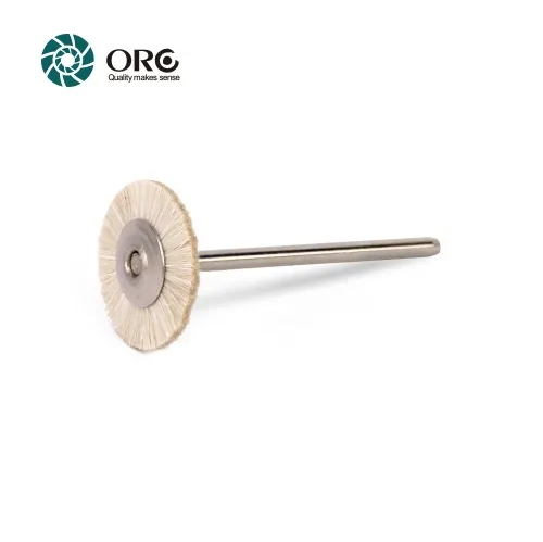Circular soft white goat hair miniature brush for delicate jewelry polishing and cleaning.