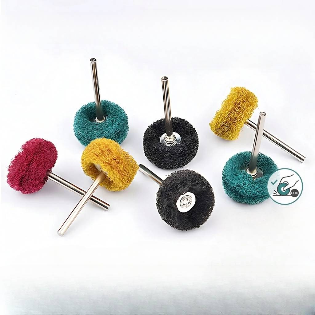 Multi-colored abrasive impregnated fiber wheels for efficient material removal and pre-polishing.