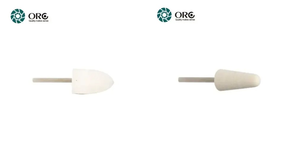 One bullet shaped and one conical shaped white felt rotary polishing head on metal shanks with a white background