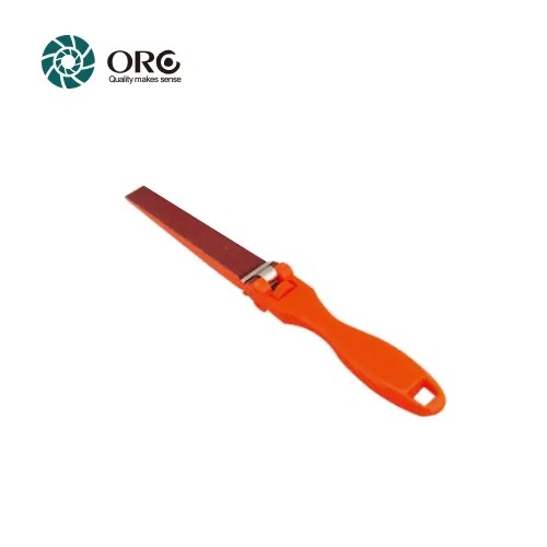 An ORO orange plastic hand sanding stick holding a strip of sandpaper for precision jewelry filing.