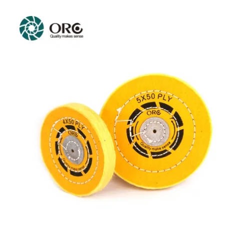 ORO yellow treated and chemically stiffened cotton buffing wheels for aggressive cutting and pre-polishing metal.