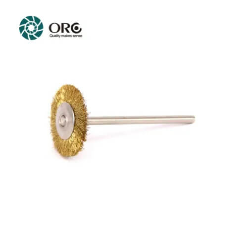 Wheel shaped rotary brass wire brush bit on metal shank for surface polishing