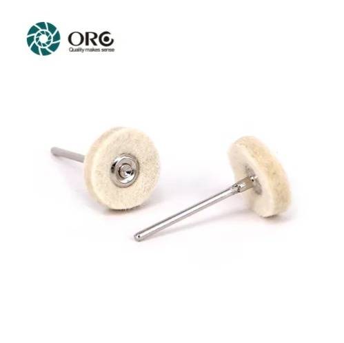 Two small wool felt buffing wheels mounted on metal mandrels for rotary tools.
