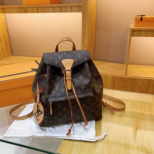 Buckle Strap Leather Printed Backpack