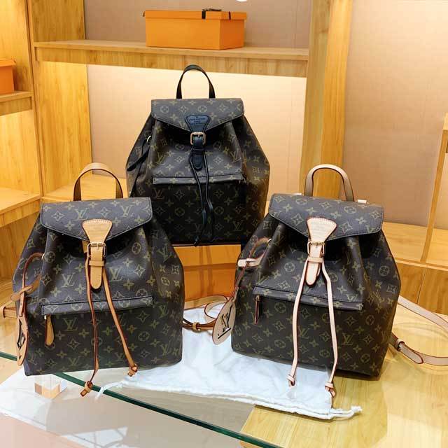 Buckle Strap Leather Printed Backpack