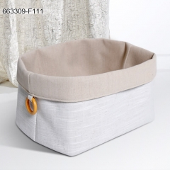 Foldable fabric storage basket
