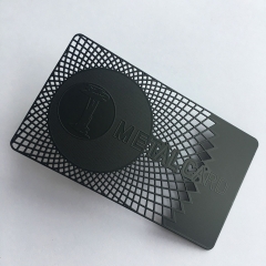 Matte black metal card with cut background and etched logo