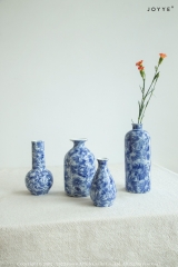 Blue and White Flower-Stamped Ceramic Vase Collection