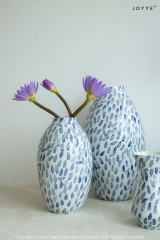 Blue and White Stamped Ceramic Vase Collection