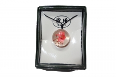 Rose in translucent pendant