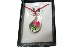 Rose in translucent pendant