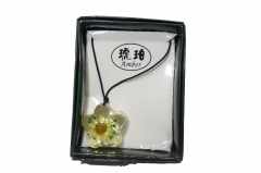 Rose in translucent pendant