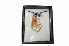 Rose in translucent pendant