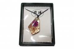 Rose in translucent pendant