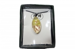 Rose in translucent pendant