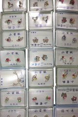 24 pr RHODIUME STUDS WITH COL STONE INSETS IN PVC GIFT BOX