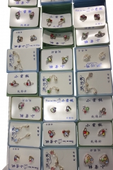 24 pr RHODIUME STUDS WITH COL STONE INSETS IN PVC GIFT BOX