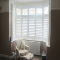 wooden white plantation shutters for window and door