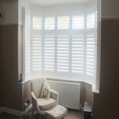 Round wooden white louver plantation shutters for window and door