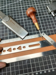 Custom oblong punches (sword handle)