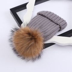Wholesale large raccoon fur ball knit hat knit beanie cap winter hats with fur pom poms