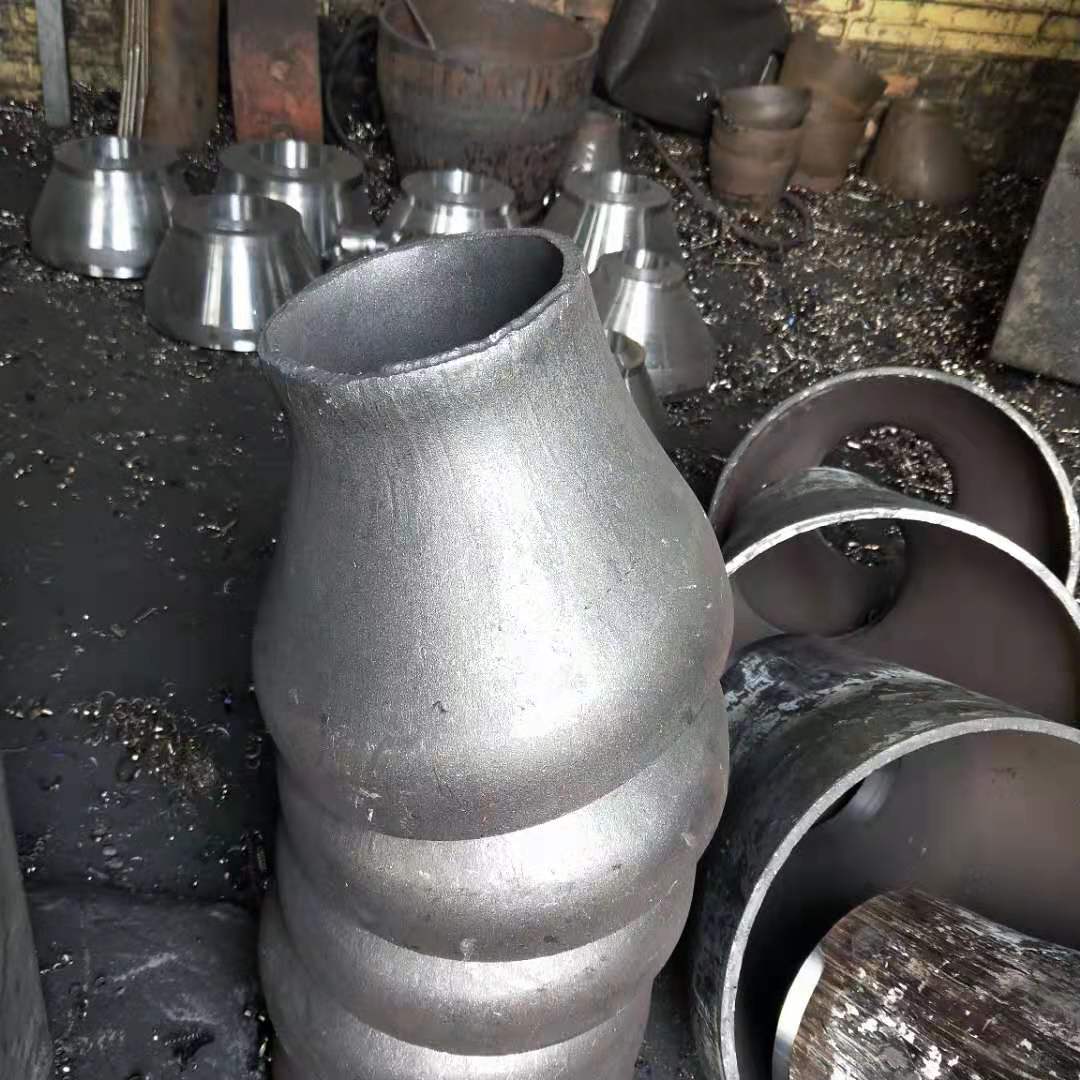 Fabrication of carbon steel reducer