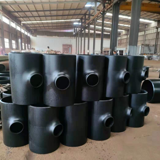 What are the chemical compositions of carbon steel tees