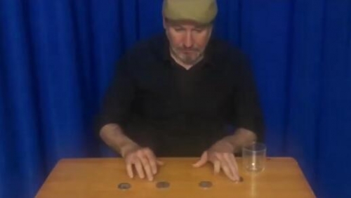 Joaquin Matas - Coins Through the Table