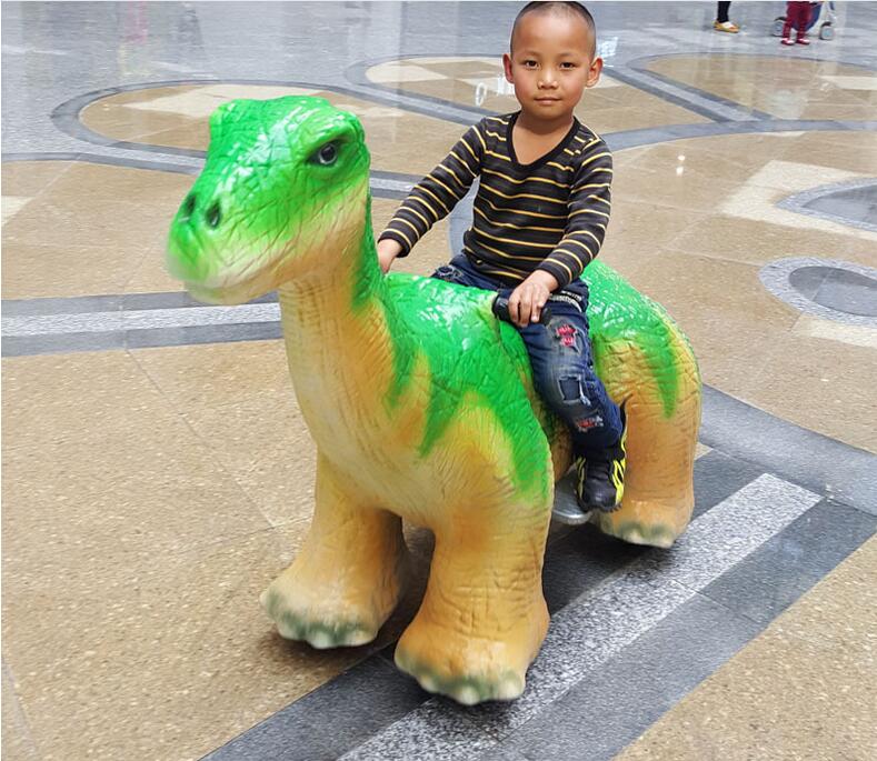 motorized dinosaur ride on toy