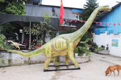 Estatua de fibra de vidrio de dinosaurio de tamaño natural al aire libre