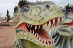 Cabeza de dinosaurio de fibra de vidrio para niños