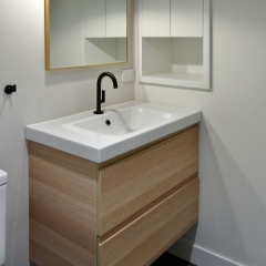 Wood tone wall mounted vanity