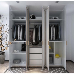 White painted casement closet with golden glazing