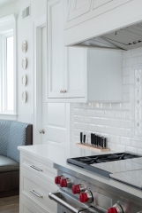 White painted transitional kitchen with dark wood island and farmhouse sink- Allandcabinet