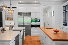 Navy blue and white painted transitional kitchen with shaker insert framed door-Allandcabient