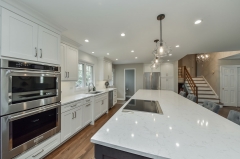 White painted shaker kitchen with stainded walnut island-Allandcabinet