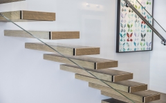Modern design floating staircase with glass railing and oak wood tread-allandmetal
