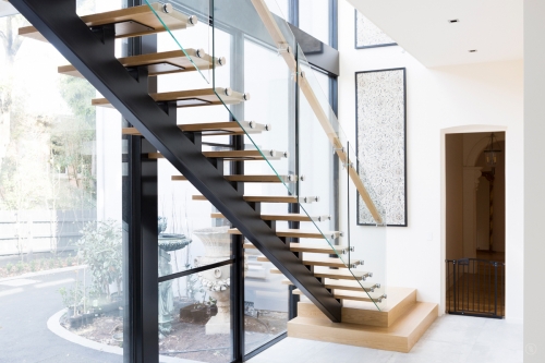 Mono stringer straight staircase with glass railing AllandMetal