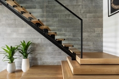 Mono staircase with black handrail and wood steps-Allandmetal