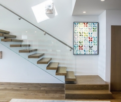 Modern design floating staircase with glass railing and oak wood tread-allandmetal