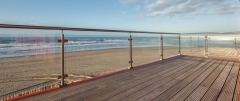 Top mounted glass balustrade with stainless steel post for exterior