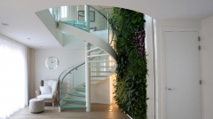 Glass staircase designs in contemporary home interiors