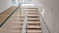 Glass wall freestanding floating staircase cantilever stairs