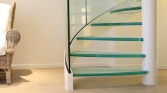 Glass staircase designs in contemporary home interiors