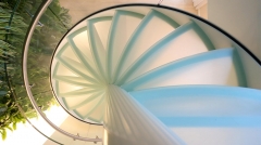 Glass staircase designs in contemporary home interiors