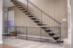 Galvanized mono stringer staircase with vertical steel railing